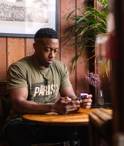 man alone on smartphone