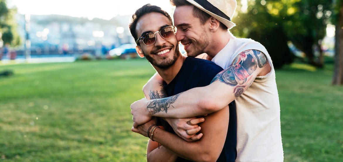 Two men hugging