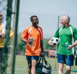 Older men playing football