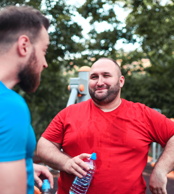 Two men outside exercising and keeping fit
